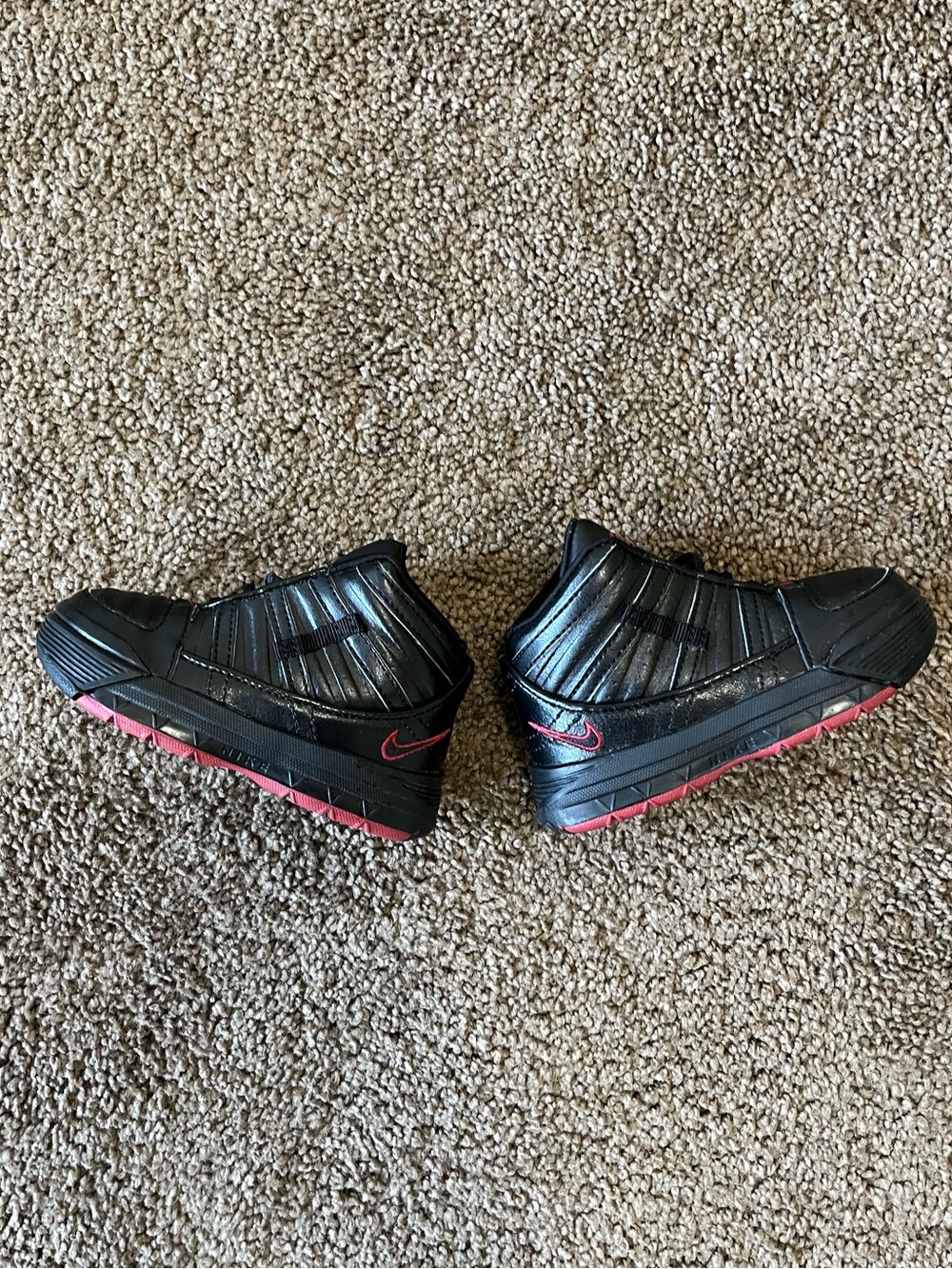 Nike Black Sneakers with Red Accents